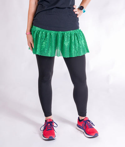 Model wearing Green Sparkle Running Skirt with Crops underneath