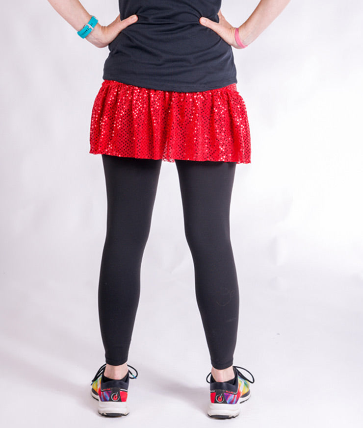 red sparkle running skirt on model waist down back view