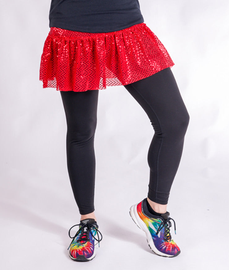 red sparkle running skirt on model waist down