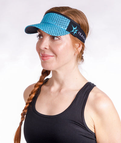 side view of turquoise blue visor on model